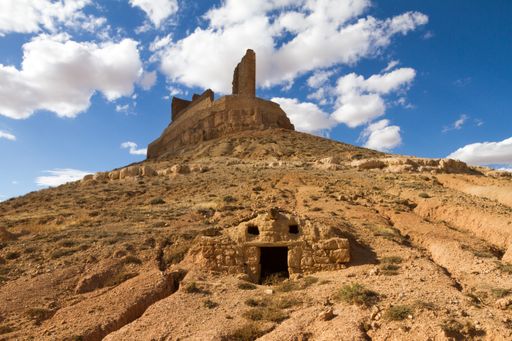 A low angle shot of Castillo de Montuenga de Soria in Spain under a cloudy sky