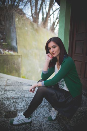 Potrait of Caucasian female posing for the camera in urban environment