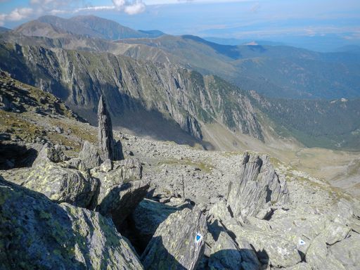 A mesmerizing view of Fagaras mountains under a cloudy sky in Romania