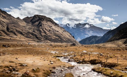 Camping at Soraypampa, in the bottom of a glacial valley, for trekkers doing the Salkantay Trek