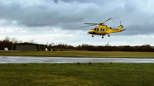 Helicopter AW169 flying low in Hendstridge Airfield