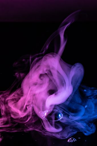 An empty scene with glowing pink and blue smoke environment atmosphere on the floor