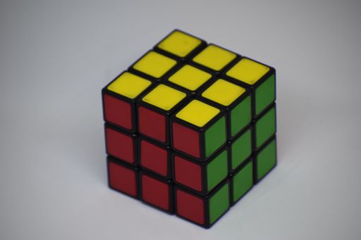 A solved Rubik's cube on a white background