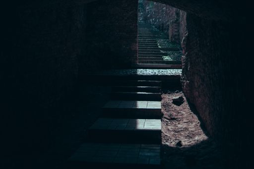 A stairway partially letting light from the outside in