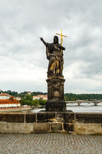 A vertical shot of the statue of John the baptist in Prague, the Czech Republic
