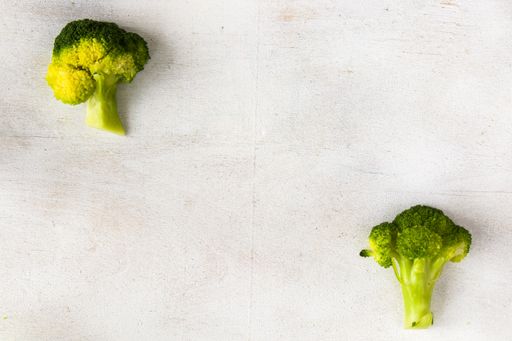 A closeup shot of blanched broccoli with space for text in the center