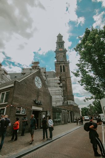 Vertical shot of a catholic church on the streets of Amsterdam, Netherlands