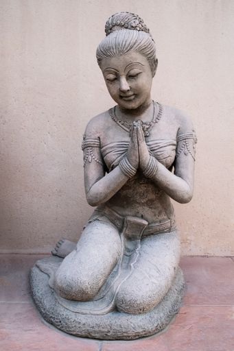 Thai woman statue praying, Chiang Mai Thailand.