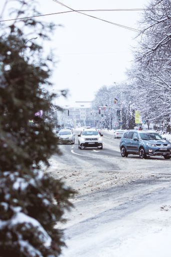 Radauti - Romania - 7th February 2020: Road with cars in the city during winter