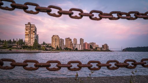 A beautiful view of residential buildings on the Pacific Ocean Coast during sunset