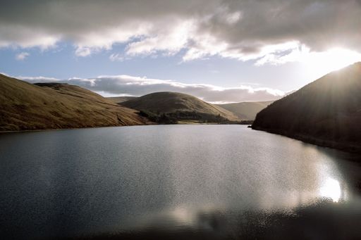 An aerial view of St Marys Loch in the Scort during cloudy weather in the UK