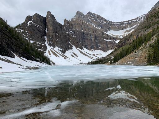A stunning view of Lake Louise in Canada's Banff National Park on a foggy day