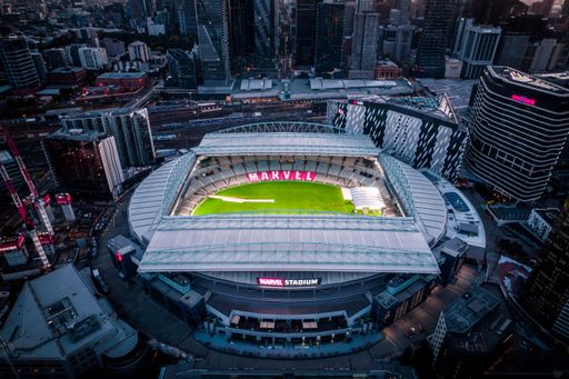 An aerial view of Marvel stadium with bright green grass and red sign. Melbourne, Australia.
