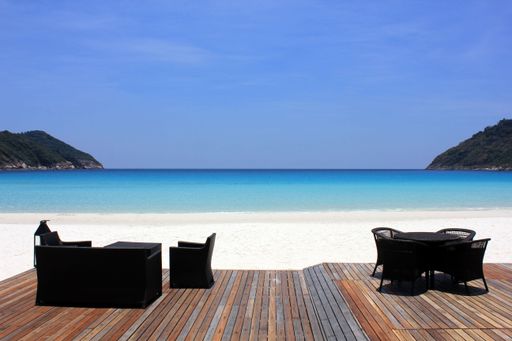 A wooden deck overlooking a stunning beach in Pulau Redang, Malaysia, Asia
