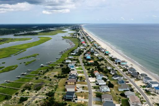 A landscape of the Oak Island surrounded by the sea in North Carolina, the US