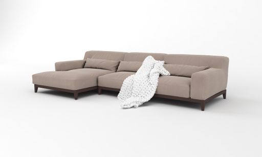 A 3D rendered modern corner sofa of light brown with a blanket on it on a white background