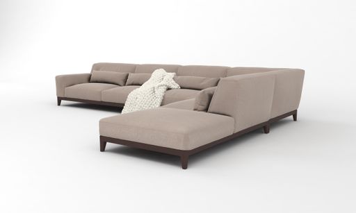 A 3D rendered modern corner sofa of light brown with a blanket on it on a white background