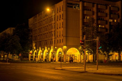 Berlin, Germany - August 3, 2019: Night shot of an illuminated restaurant in the Nikolaiviertel in downtown Berlin.