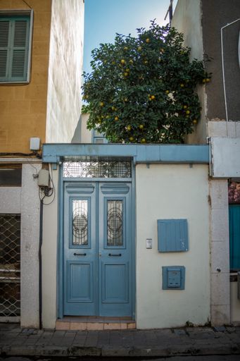The wooden doors of a building during daytime