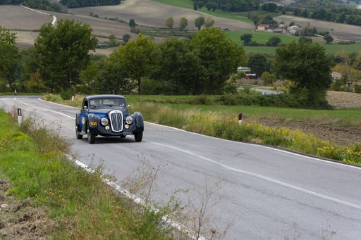 CAGLI , ITALY - OTT 24 - 2020: CAGLI , ITALY - OTT 24 - 2020: AUSTIN HEALEY 100 6 1957 an old racing car in rally Mille Miglia 2020 the famous italian