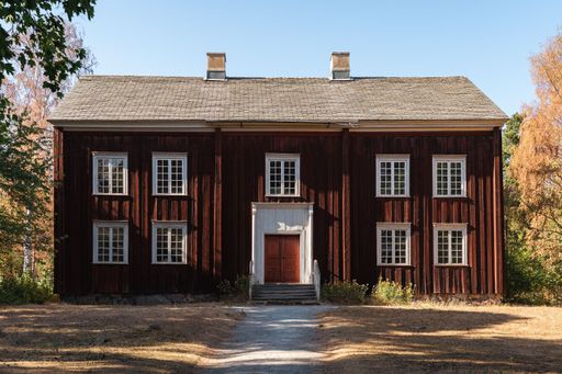 An aged structure with numerous windows near the Skansen open air museum, Stockholm