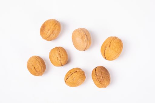 A top view of walnuts isolated on white background