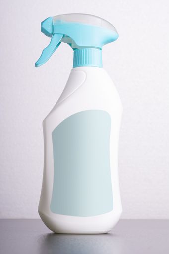 A cleaning liquid bottle in front of a light gray background, editable mockup ready for your design