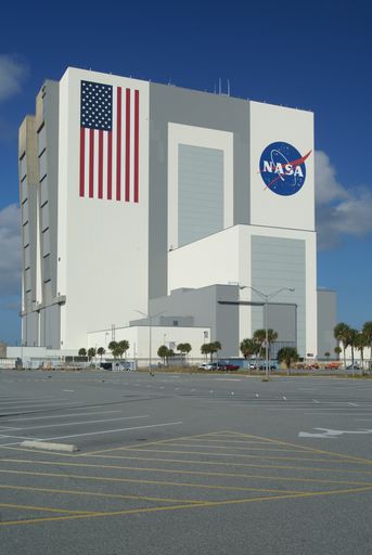 The Vehicle Assembly Building of NASA at John F Kennedy Space Center under a blue sky