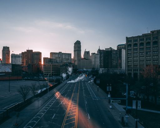 Beautiful modern cityscape with an empty street during the sunrise