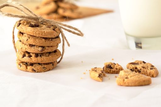A selective focus shot of delicious piled cookies with a blurred background