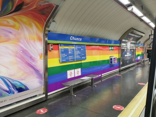 Madrid Spain. March 22, 2021. Chueca station metro platform, line 5 of the Madrid metro, decorated with the colors of the gay pride flag.