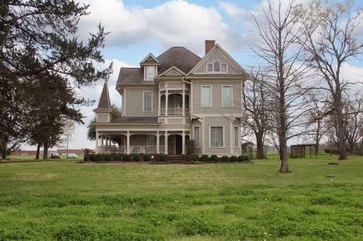 Historic Victorian Mansion Located in Rural East Texas With Blue Sky