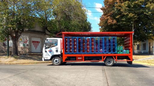 Bottled water delivery truck Agrale A8700 in the street. Sunny day
