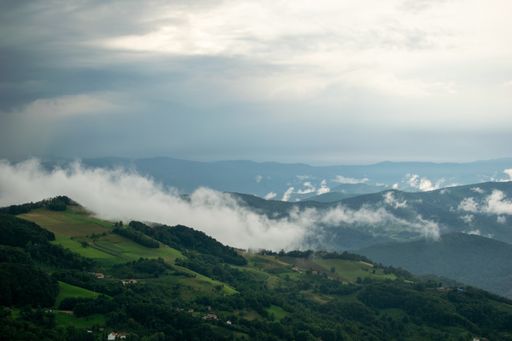 A beautiful mountainous landscape under a cloudy sky