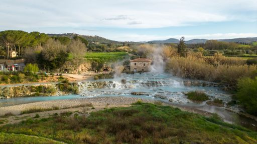 This idyllic landscape features a Saturnia bath, Italy