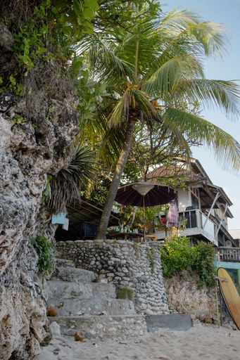 This shot was taken early morning, just after sunrise at Bingin Beach, Uluwatu. It shows the beautiful tropical coastal landscape of Bali.