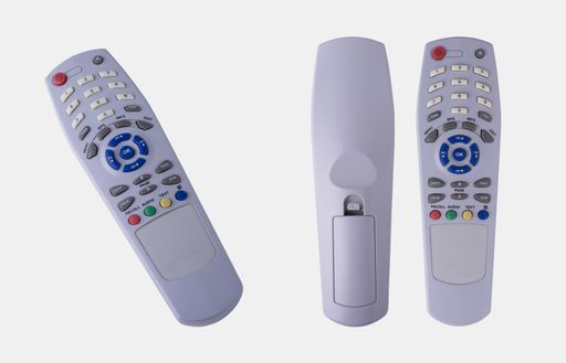 The three TV remote controls isolated on the white background