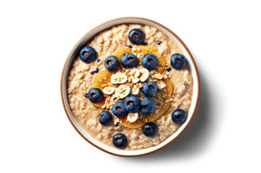 This stock photo features a white ceramic bowl full of steaming oatmeal, with fresh blueberries scattered on top