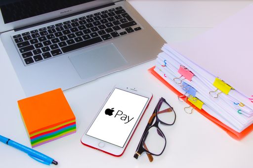 Spain. 03, 23, 2021. A desktop with an Iphone with the Apple Pay application on the screen