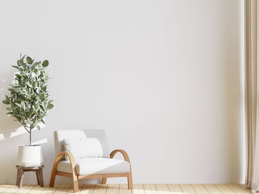 A 3D illustration of a home interior featured two pastel armchair