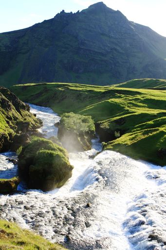 waterfalls and rapids adorning the Skoga River near Skogafoss waterfall