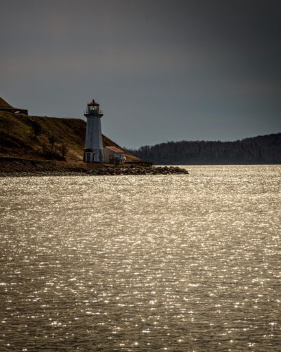 A stunning image of a lighthouse in Halifax Harbourfront, Georges Island, Waterfront