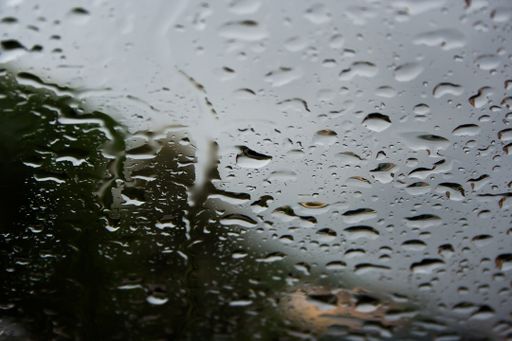 A closeup of water drops on window glass