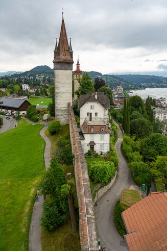 A high-angle vertical shot of the iconic Mannliturm Gurard Tower in the city of Lucerne, Switzerland