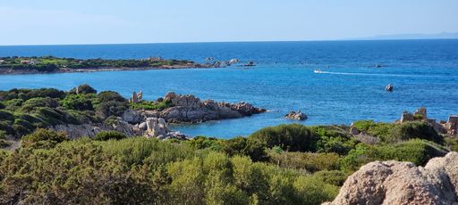 Aerial view of a scenic coastline with small islands, white sandy beaches and turquoise waters
