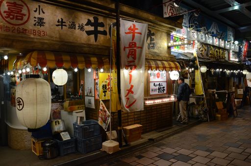 Night walk through the narrow Tokyo streets of Ginza district and its small restaurants