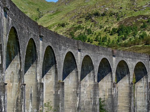 iconic Glenfinnan viaduct of the jacobite steam train in the scottish highlands.