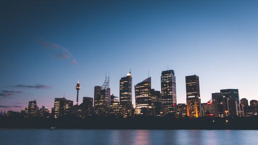 A beautiful wide shot of Sydney skyline at dusk