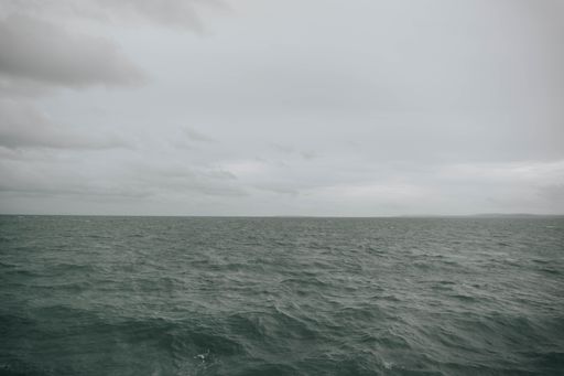 A beautiful view of a peaceful sea under dark storm clouds, Bacolod City, Negros Occidental