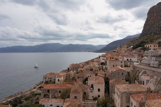 An aerial shot of houses on the hill in the old town of Monemvasia, Greece